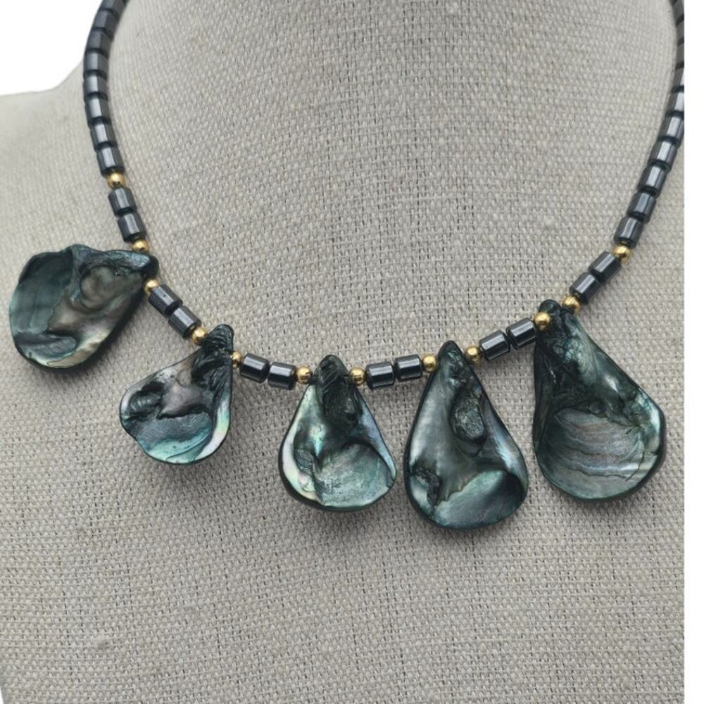 Elegant Black and Green Shell Pendant Necklace with Gold Accents